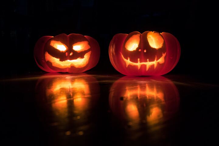 two jackolanterns lit from within
